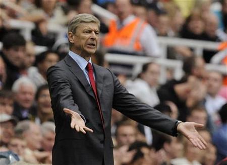 Arsenal's Wenger reacts during their English Premier League soccer match against Newcastle United in Newcastle